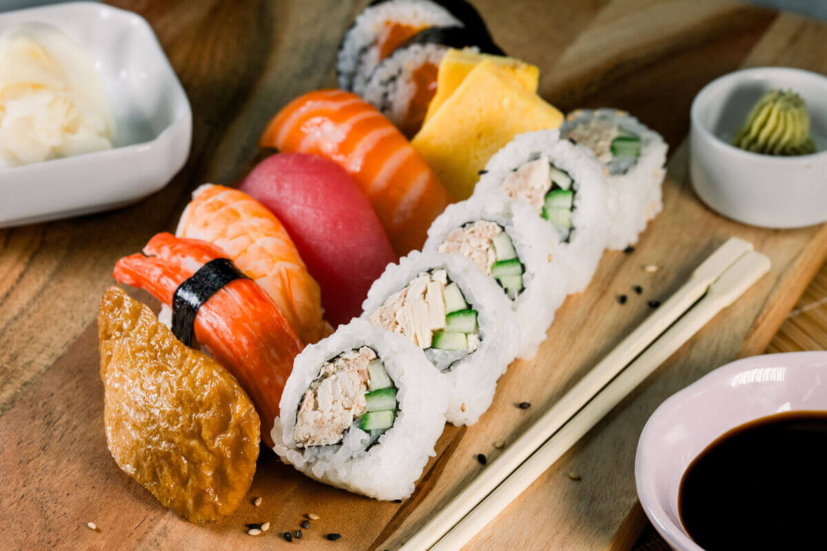 Sushi displayed on a wooden board